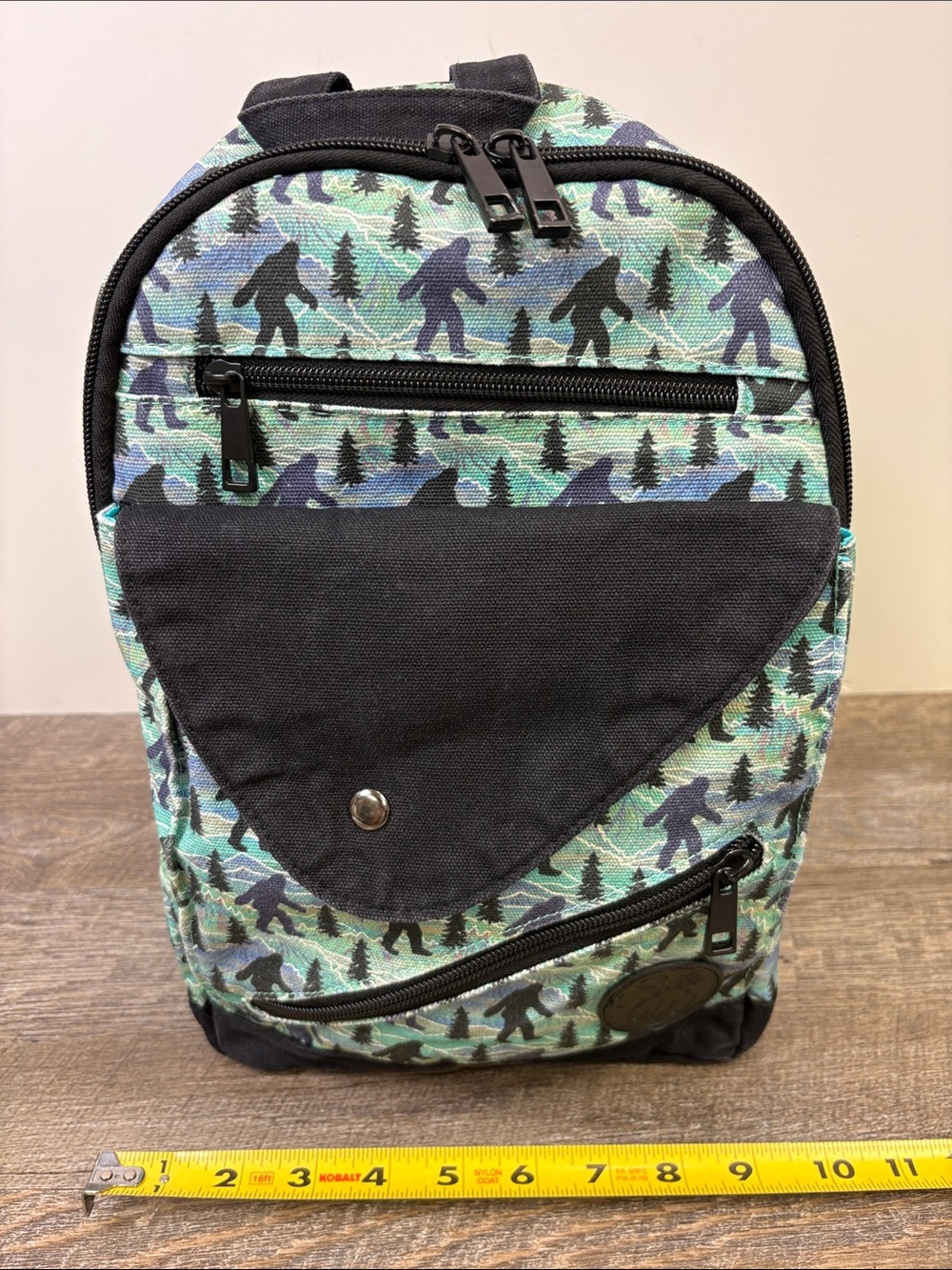 Sipsey Wilder Bigfoot Mini Backpack Sling Bag Sasquatch Print Crossbody - Picture 14 of 16